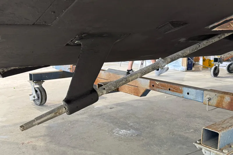 Chasin Tail Yacht Photos Pics 2011 Luhrs 30 Open boat underbody with visible propeller shaft and support structure.