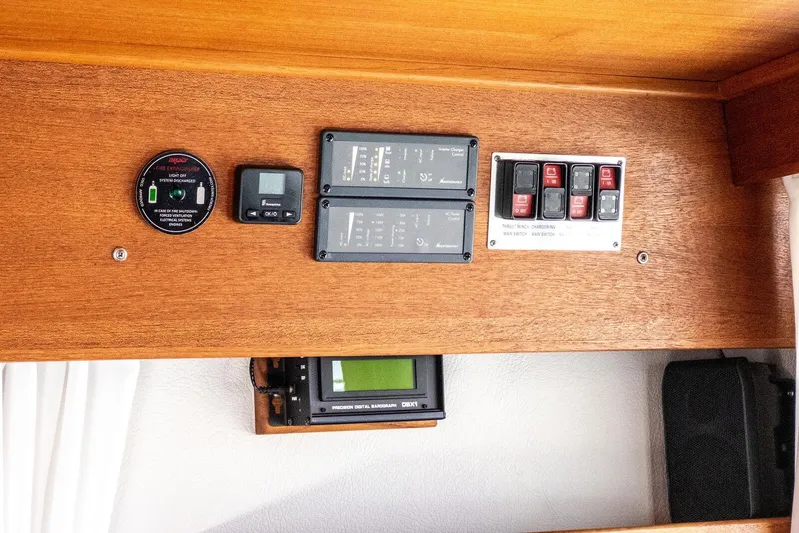  Yacht Photos Pics Control panel of a 2019 Targa 32 boat with various switches and gauges.