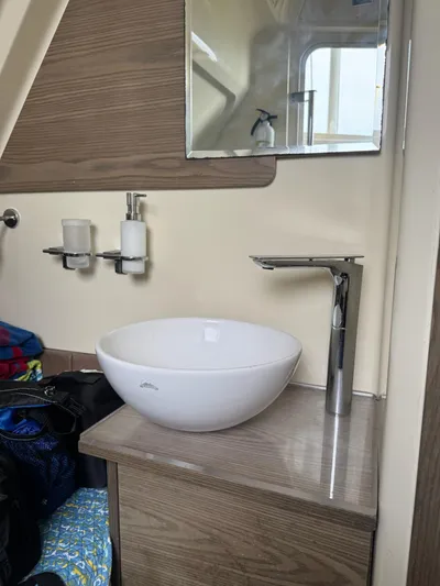  Yacht Photos Pics Modern bathroom sink in 2020 Chris-Craft Catalina 30 boat interior.