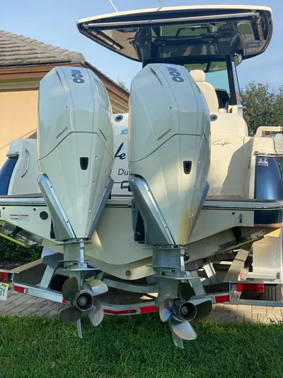  Yacht Photos Pics 2020 Chris-Craft Catalina 30 with dual outboard engines on a trailer.