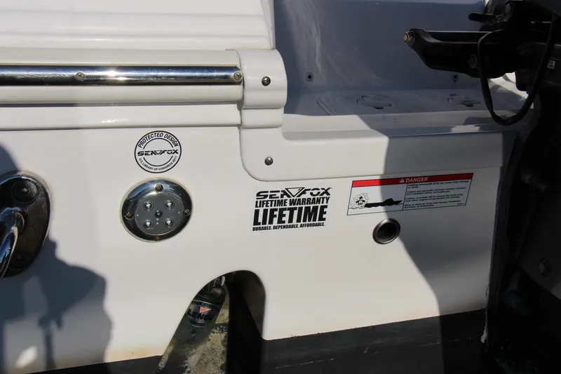 III Yacht Photos Pics 2020 Sea Fox 328 Commander boat with lifetime warranty label and safety warning.