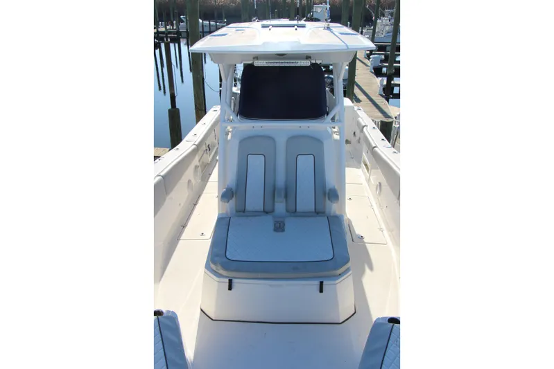 III Yacht Photos Pics 2020 Sea Fox 328 Commander boat interior with seating and helm station.