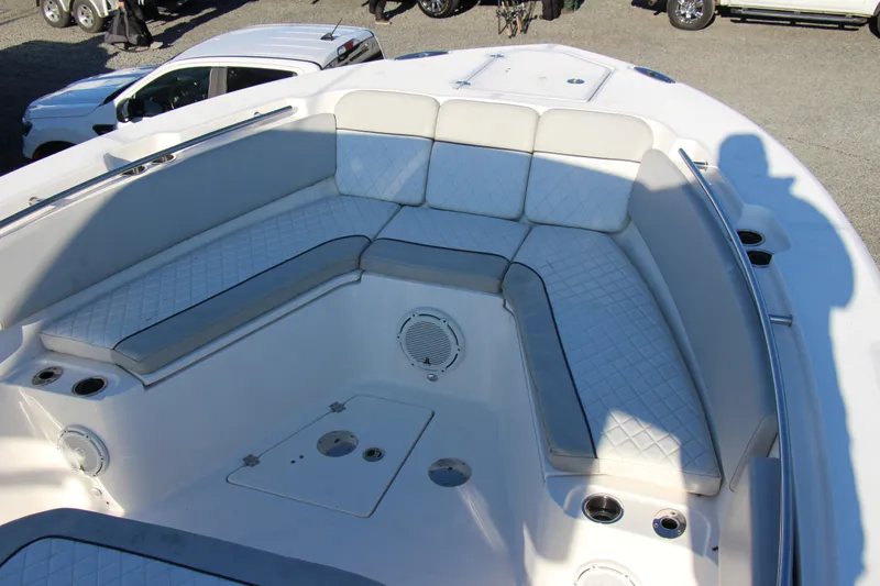 III Yacht Photos Pics 2020 Sea Fox 328 Commander boat interior with cushioned seating and cup holders.