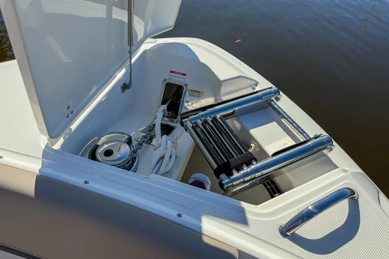 Yacht Photos Pics Anchor compartment of 2025 Boston Whaler 330 Vantage with rope and ladder.