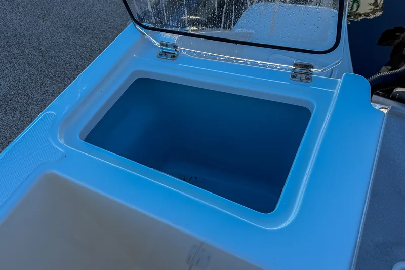  Yacht Photos Pics Boston Whaler 330 Vantage 2025, open storage compartment on the boat.