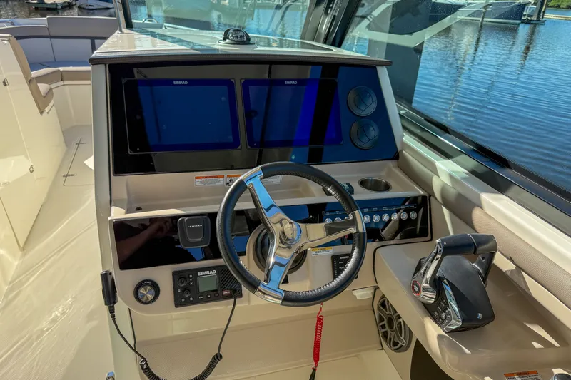  Yacht Photos Pics Helm of 2025 Boston Whaler 330 Vantage with Simrad displays.