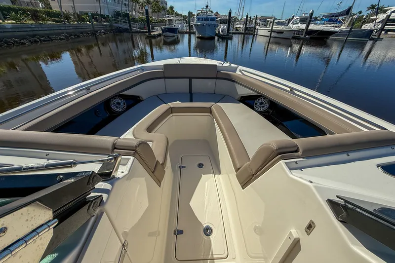  Yacht Photos Pics Interior view of 2025 Boston Whaler 330 Vantage boat in harbor.