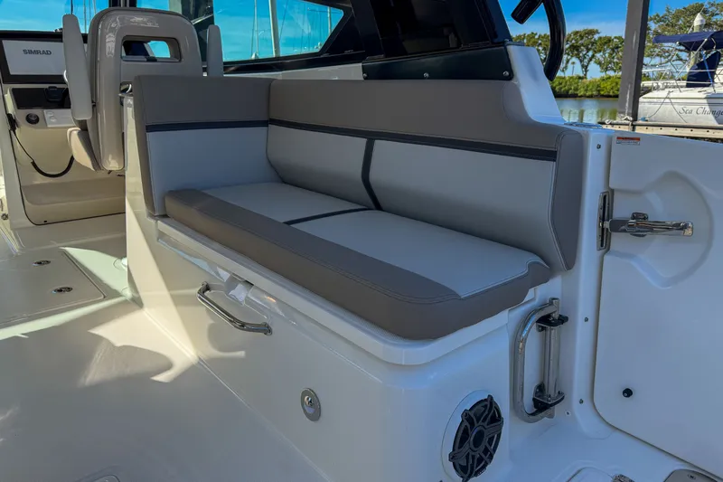  Yacht Photos Pics Interior of 2025 Boston Whaler 330 Vantage with gray seating.