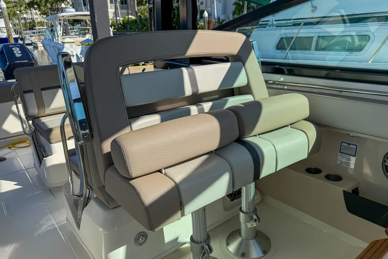  Yacht Photos Pics Interior of 2025 Boston Whaler 330 Vantage with luxurious seating.
