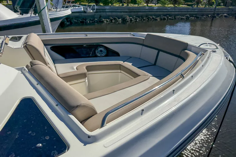  Yacht Photos Pics 2025 Boston Whaler 330 Vantage with luxurious bow seating area.