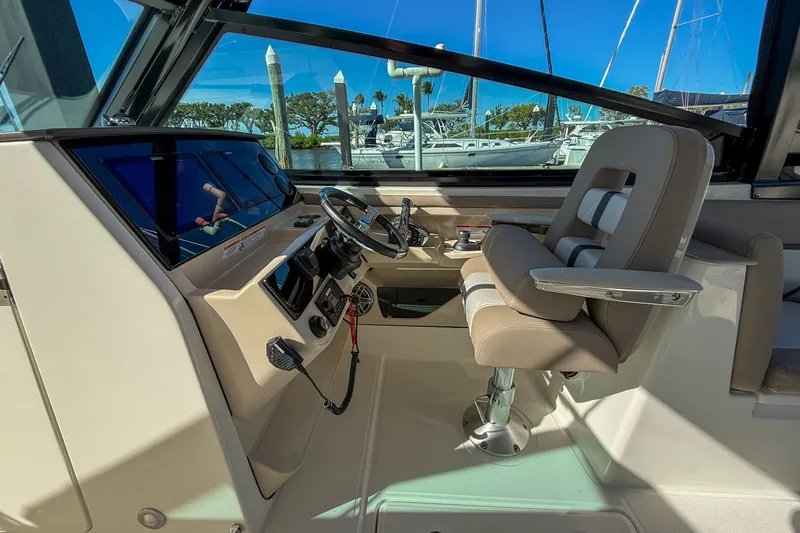  Yacht Photos Pics Interior of 2025 Boston Whaler 330 Vantage with helm station.