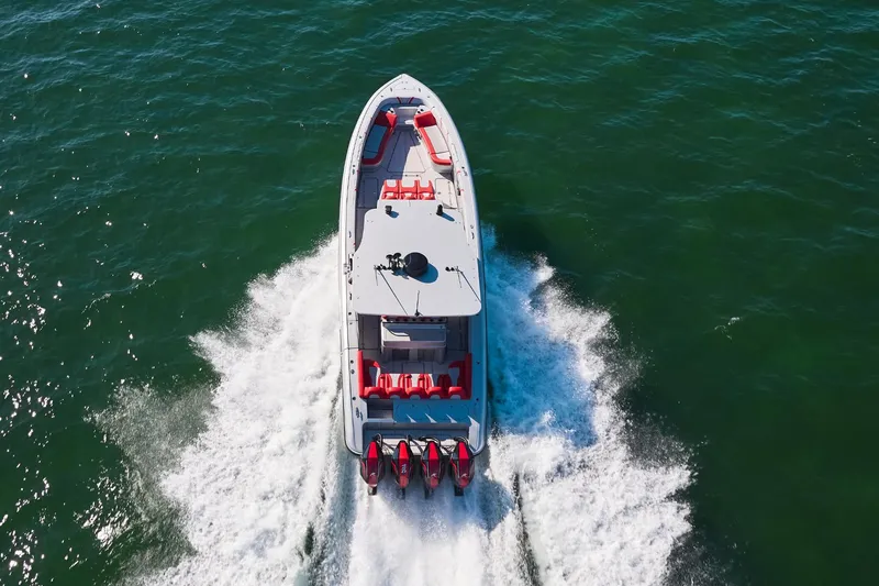  Yacht Photos Pics 2017 Midnight Express 43' Open boat cruising on open water, aerial view.