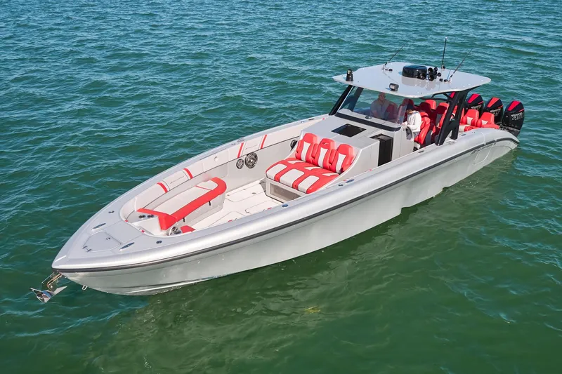  Yacht Photos Pics 2017 Midnight Express 43' Open boat with red and white seating on clear water.