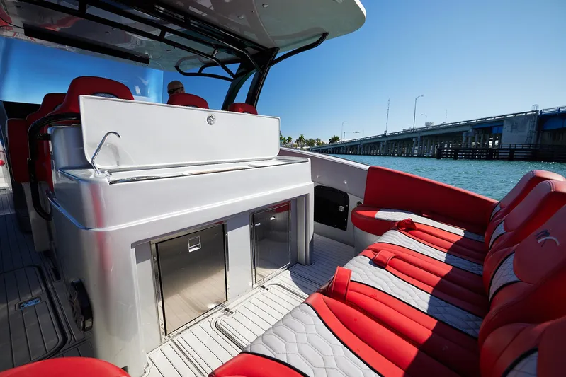  Yacht Photos Pics 2017 Midnight Express 43' Open boat with red seating, sleek design, and bridge view.