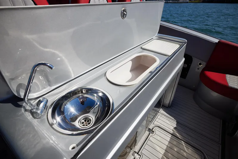  Yacht Photos Pics 2017 Midnight Express 43' Open boat sink and counter detail, featuring sleek design and functionality.