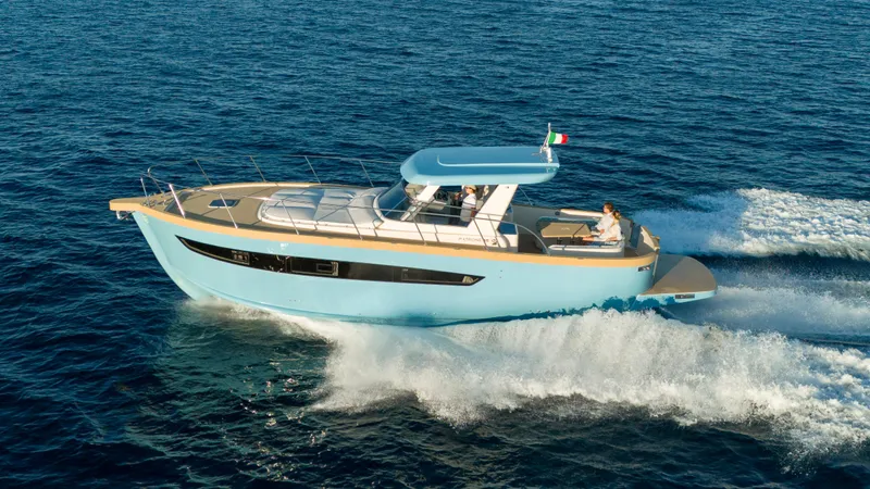  Yacht Photos Pics 2024 Patrone 45 OPEN yacht cruising on the ocean, showcasing sleek design and luxury.