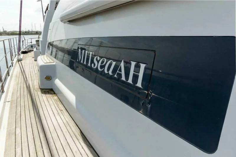  Yacht Photos Pics Luxury yacht "MITseaAH" by Pendennis, model 155, 2004, docked with wooden deck.