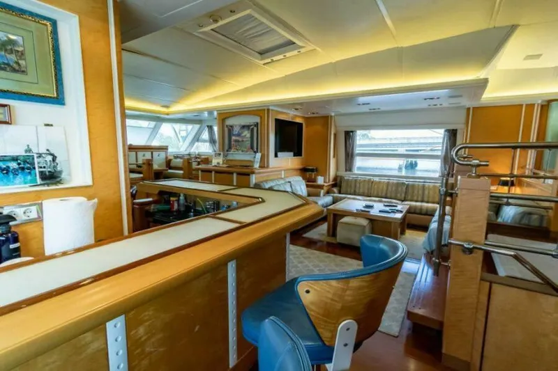 Yacht Photos Pics Luxurious interior of 2004 Pendennis 155 yacht with modern furnishings and elegant design.