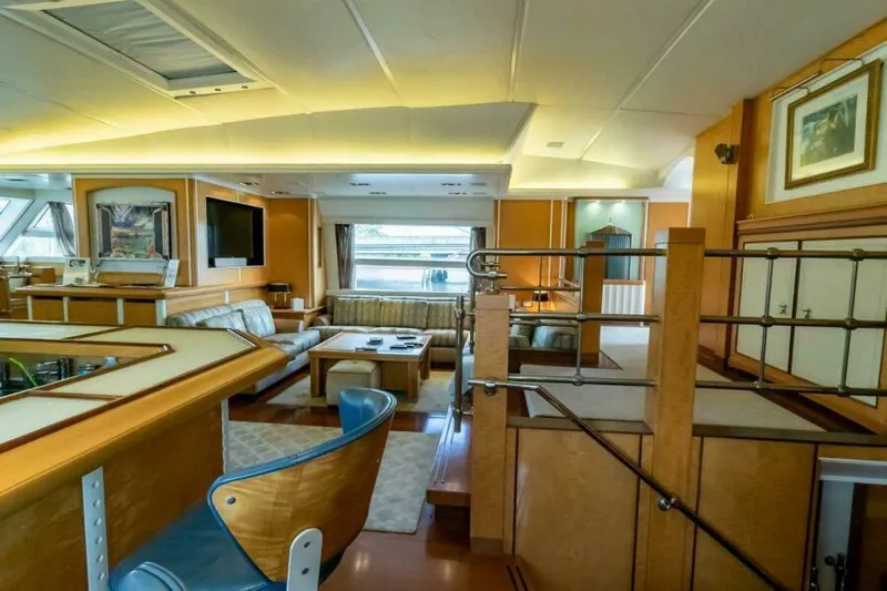  Yacht Photos Pics Luxurious interior of 2004 Pendennis 155 yacht with modern furnishings and elegant decor.