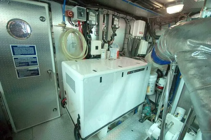 Always Something Yacht Photos Pics Engine room of 2009 Grand Harbour 66 Motoryacht with equipment and control panels.