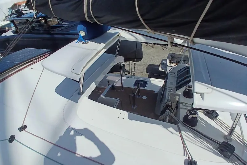 Jack Yacht Photos Pics 2024 Lagoon 42 catamaran deck with solar panels and rigging details.