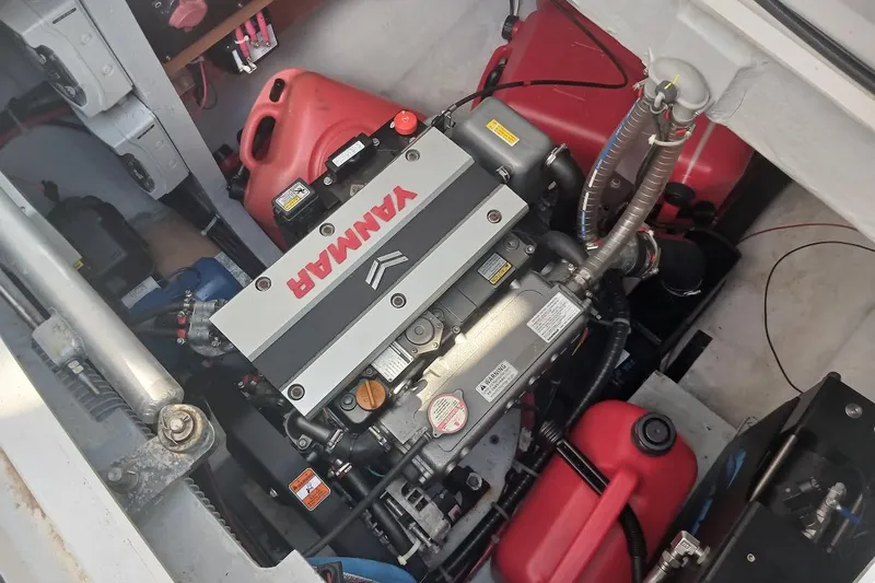 Jack Yacht Photos Pics Engine compartment of a 2024 Lagoon 42 catamaran featuring a Yanmar engine.