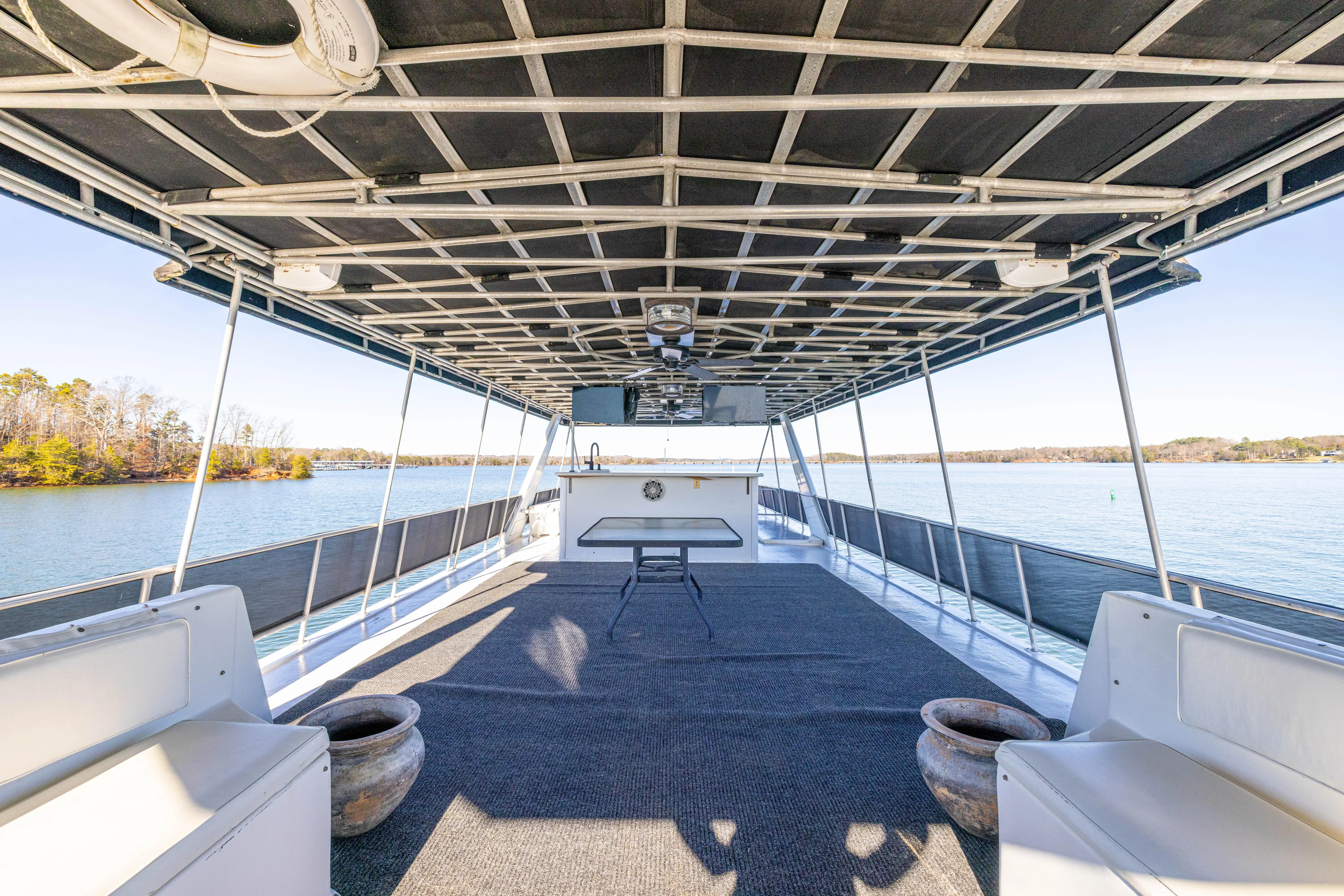  Yacht Photos Pics 1998 Stardust Cruisers Custom Luxury Houseboat interior with spacious deck and lake view.