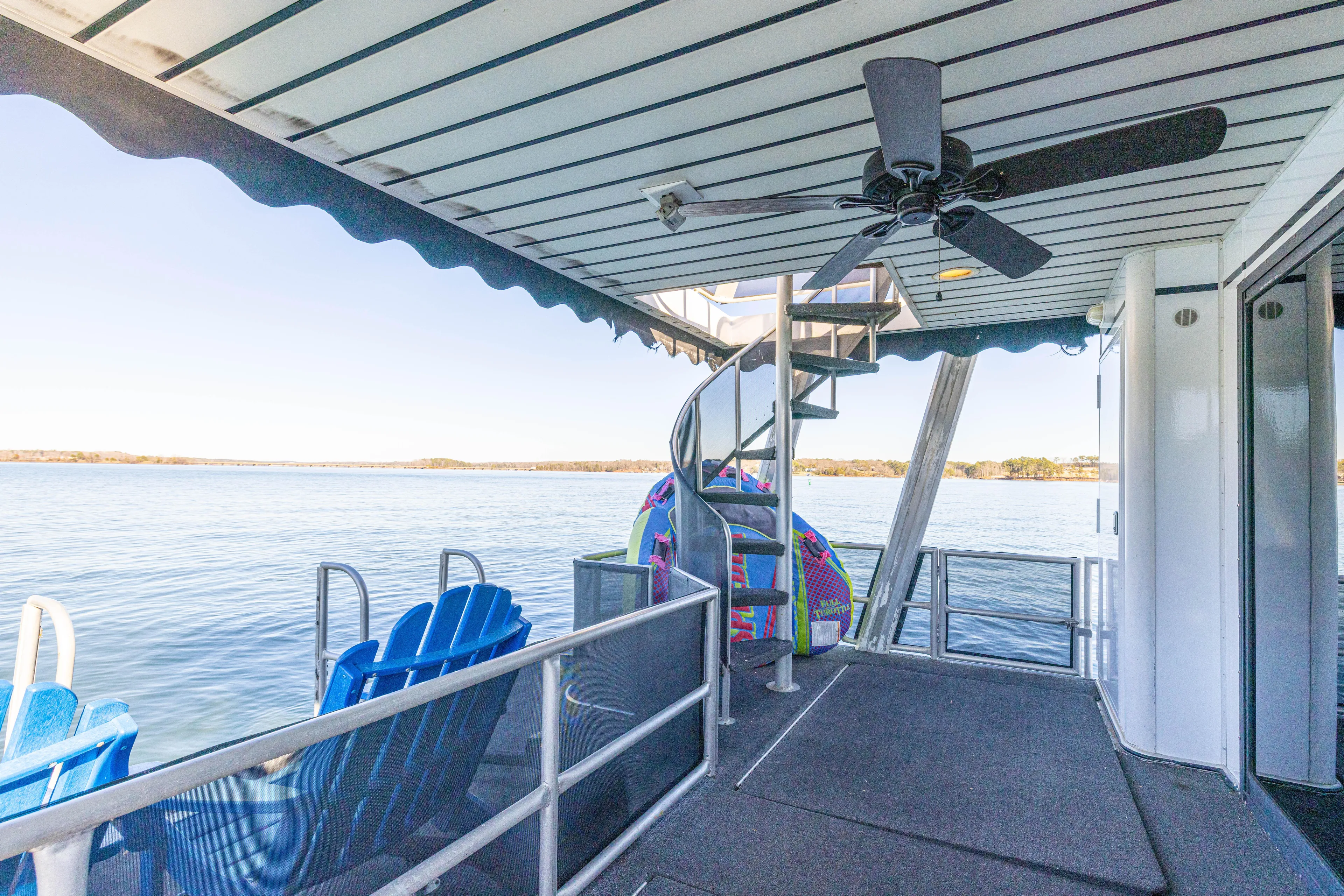  Yacht Photos Pics 1998 Stardust Cruisers Custom Luxury Houseboat deck with spiral staircase and lake view.
