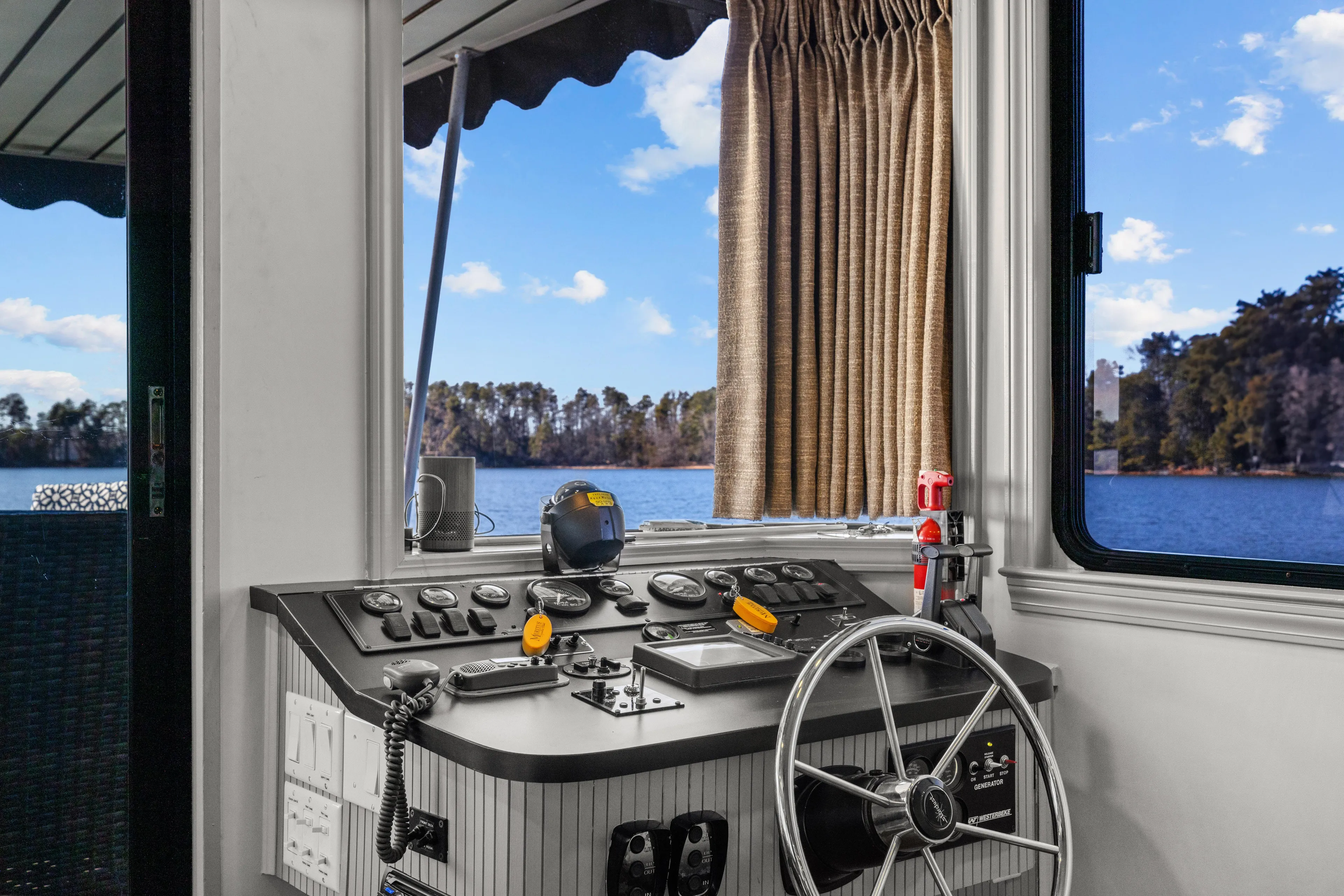  Yacht Photos Pics 1998 Stardust Cruisers Custom Luxury Houseboat helm with scenic lake view.