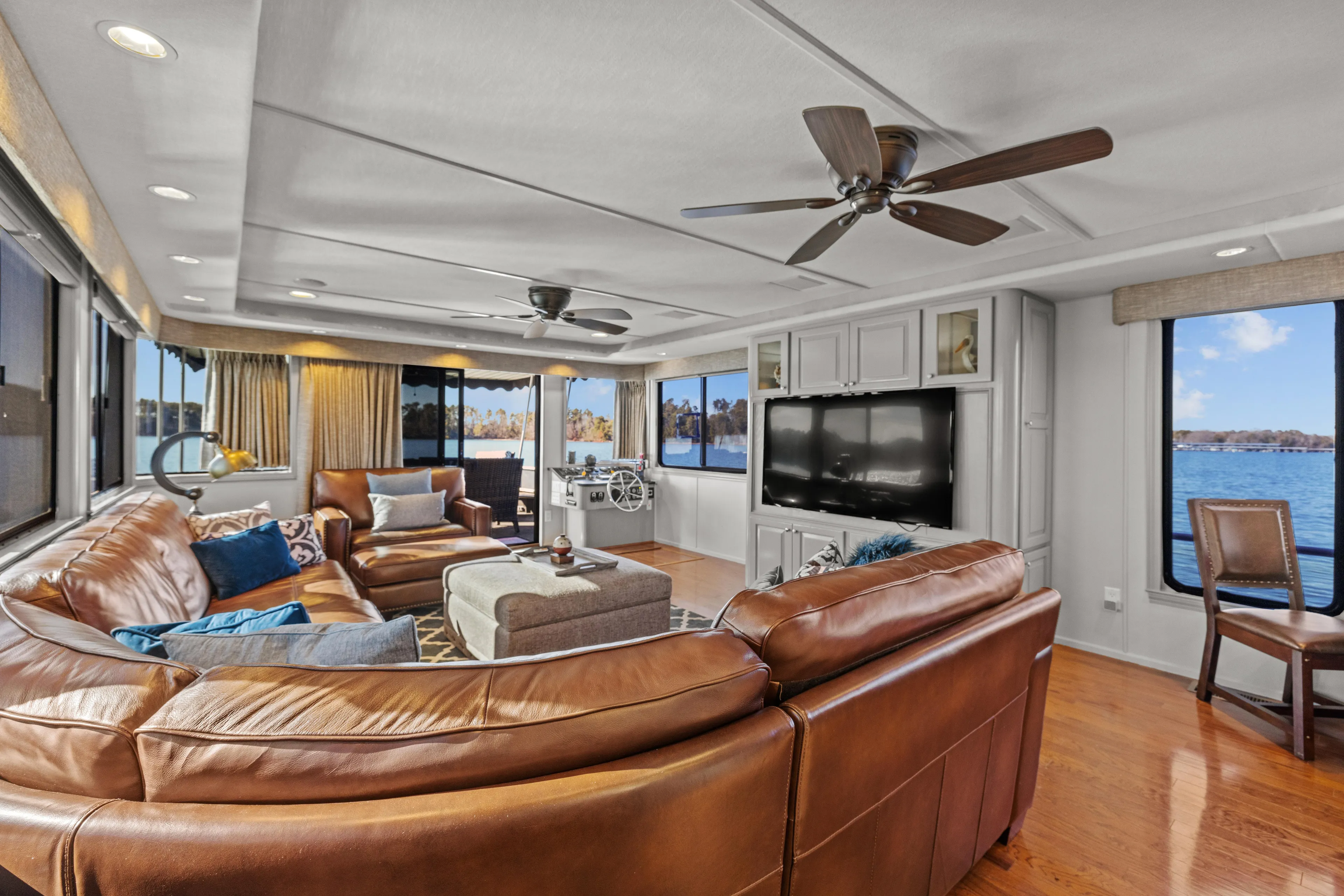  Yacht Photos Pics Luxurious 1998 Stardust Cruisers houseboat interior with leather seating, large windows, and modern amenities.