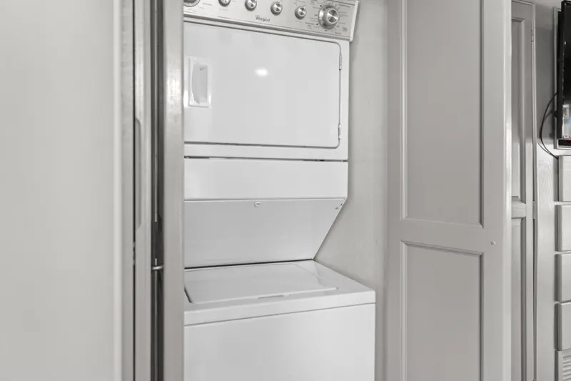  Yacht Photos Pics Stacked washer and dryer in 1998 Stardust Cruisers Custom Luxury Houseboat.