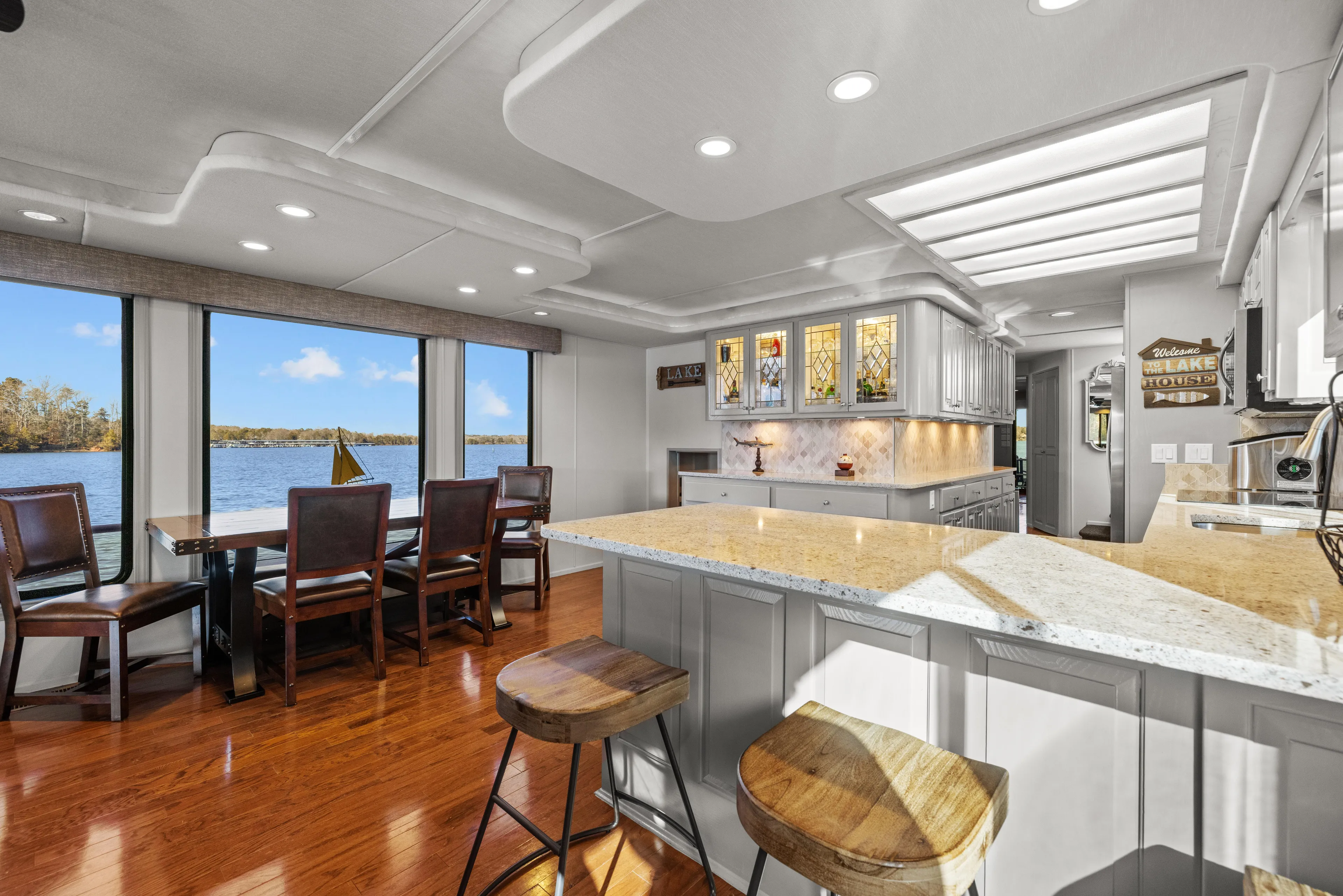  Yacht Photos Pics Luxurious 1998 Stardust Cruisers houseboat interior with modern kitchen and scenic water views.