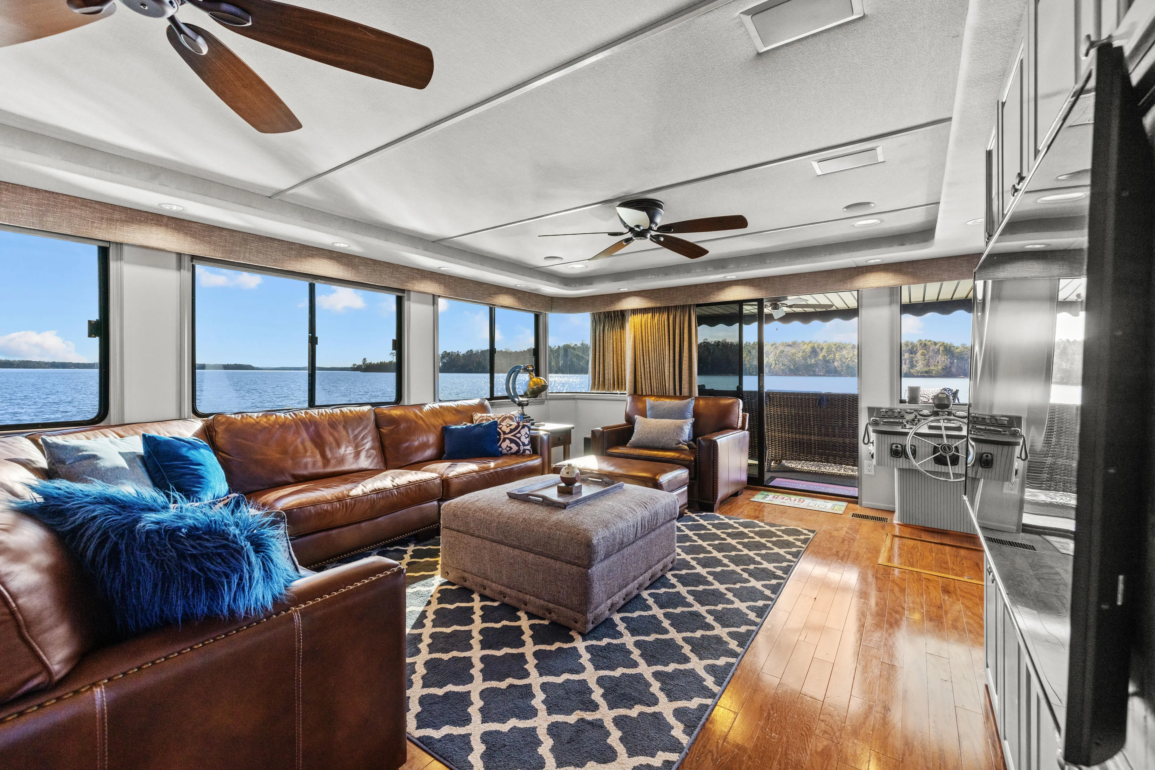  Yacht Photos Pics Luxurious 1998 Stardust Cruisers houseboat interior with leather seating, lake views, and modern amenities.