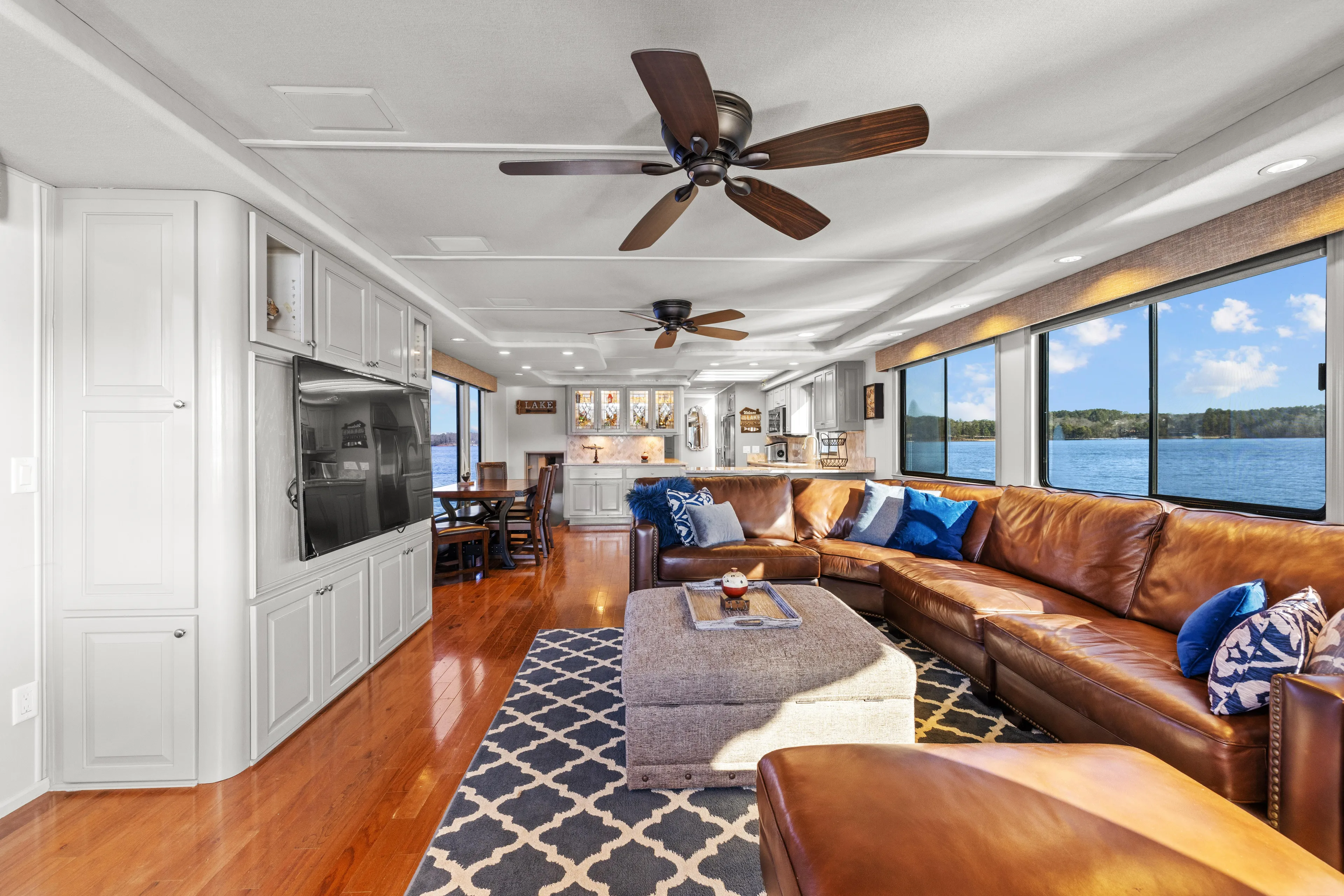  Yacht Photos Pics Luxurious 1998 Stardust Cruisers houseboat interior with leather seating, large windows, and modern amenities.