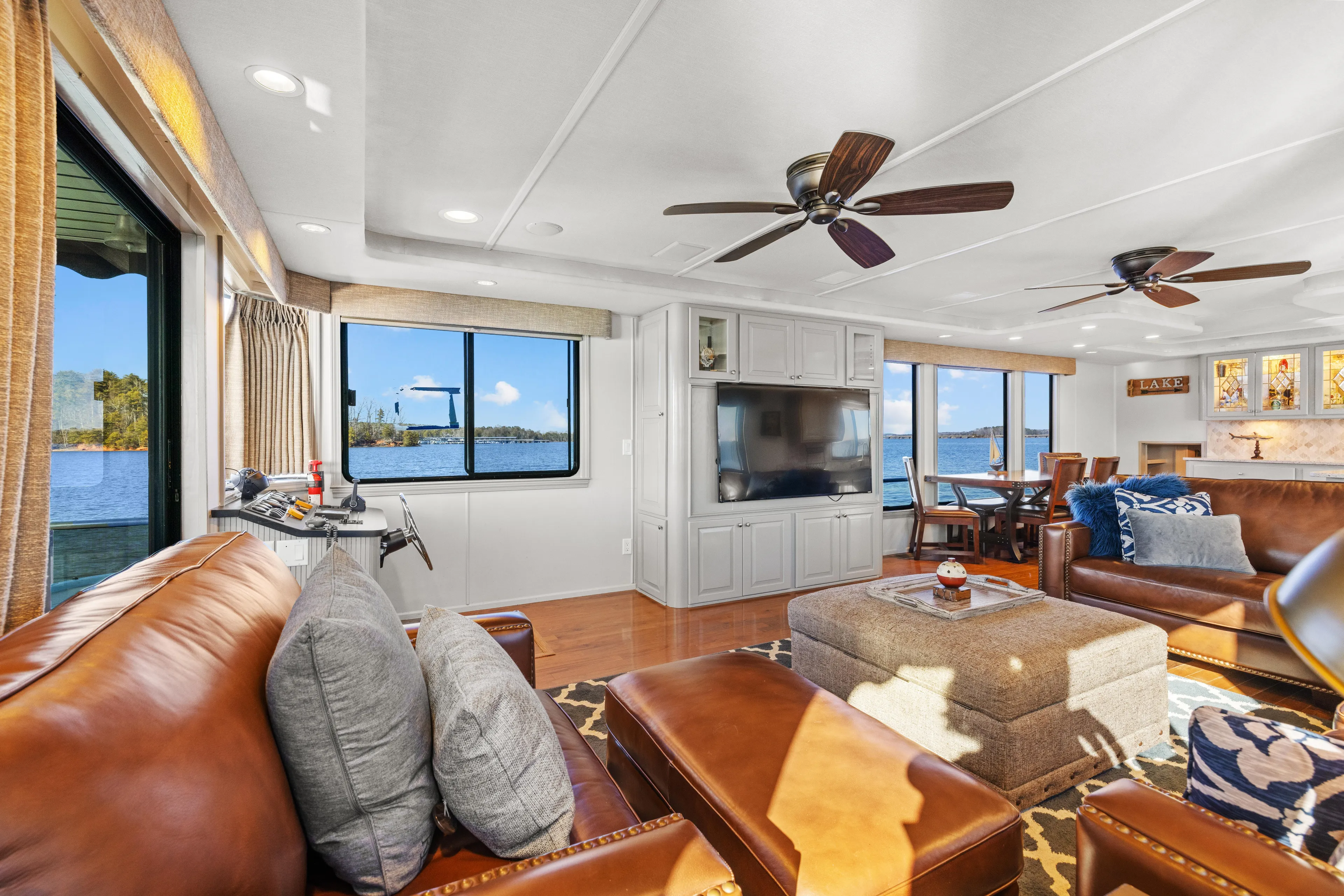  Yacht Photos Pics Luxurious 1998 Stardust Cruisers houseboat interior with leather seating, large windows, and modern amenities.