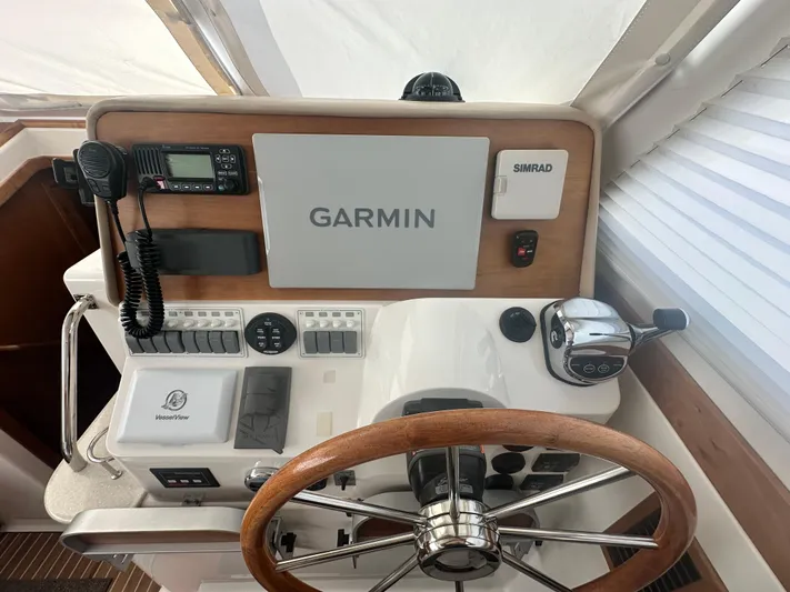 Tlc Yacht Photos Pics Helm of 2014 Back Cove 37 with Garmin and Simrad navigation systems.