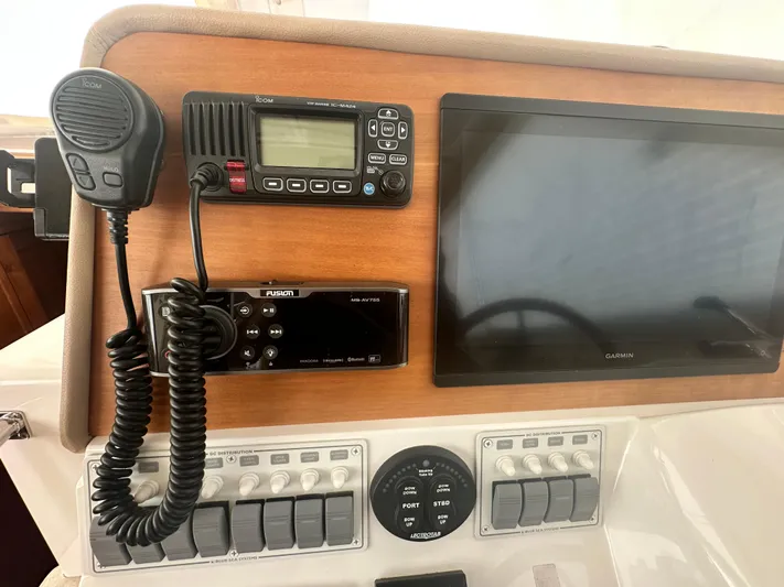 Tlc Yacht Photos Pics Control panel of a 2014 Back Cove 37 boat with radio and Garmin display.