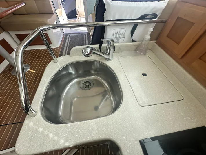 Tlc Yacht Photos Pics 2014 Back Cove 37 yacht kitchen sink with stainless steel basin and faucet.