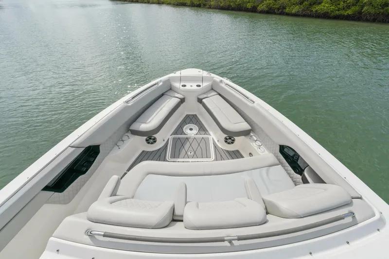  Yacht Photos Pics Luxurious 2022 Sea Ray SLX 400 Outboard boat with spacious seating on calm water.