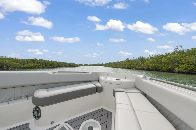  Yacht Photos Pics 2022 Sea Ray SLX 400 Outboard boat interior with scenic waterway view.