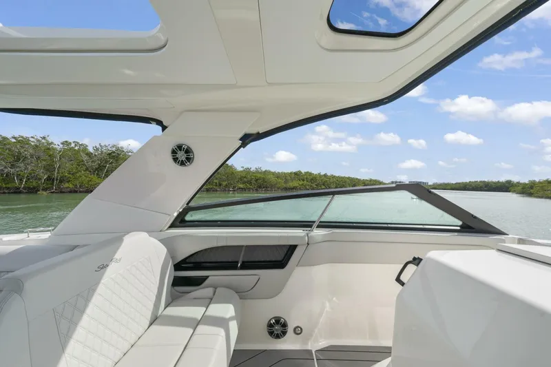  Yacht Photos Pics 2022 Sea Ray SLX 400 Outboard interior with scenic waterway view.