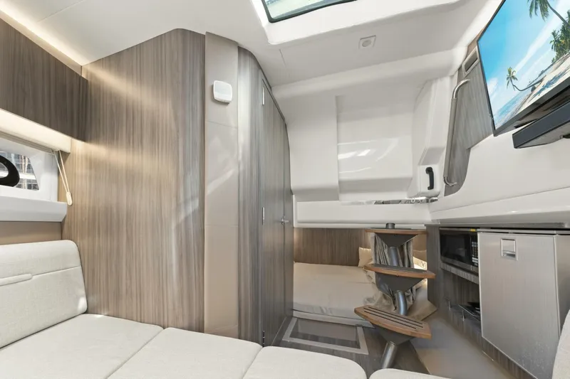  Yacht Photos Pics Luxurious interior of 2022 Sea Ray SLX 400 Outboard boat with modern amenities.