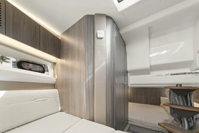  Yacht Photos Pics 2022 Sea Ray SLX 400 Outboard cabin interior with modern design and comfortable seating.