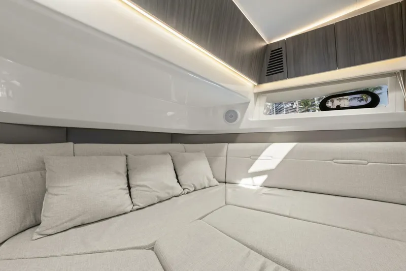  Yacht Photos Pics Interior of 2022 Sea Ray SLX 400 Outboard, featuring plush seating and modern design.