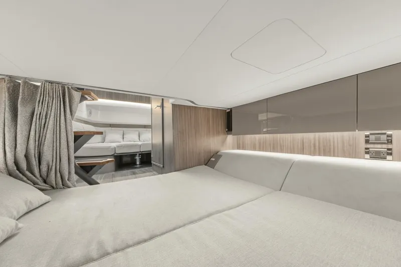  Yacht Photos Pics Luxurious interior of 2022 Sea Ray SLX 400 Outboard, featuring modern design and comfortable seating.