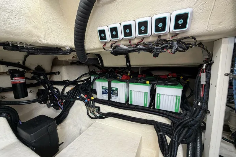  Yacht Photos Pics 2022 Sea Ray SLX 400 Outboard engine compartment with batteries and wiring.