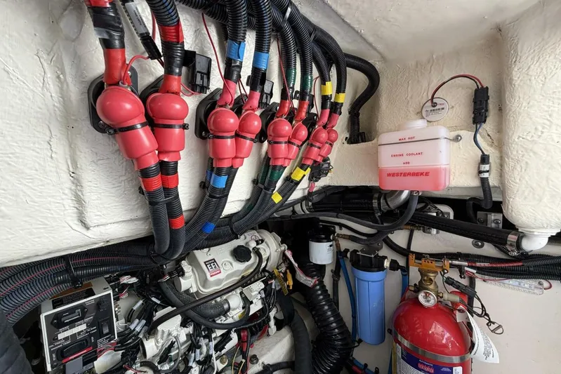  Yacht Photos Pics Engine compartment of 2022 Sea Ray SLX 400 Outboard with wiring and coolant system.