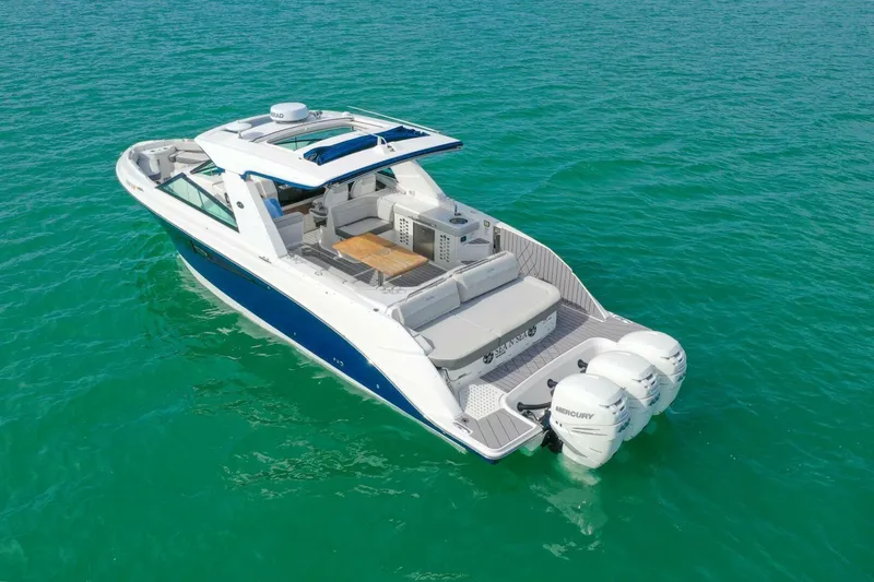  Yacht Photos Pics 2022 Sea Ray SLX 400 Outboard boat on clear turquoise water.