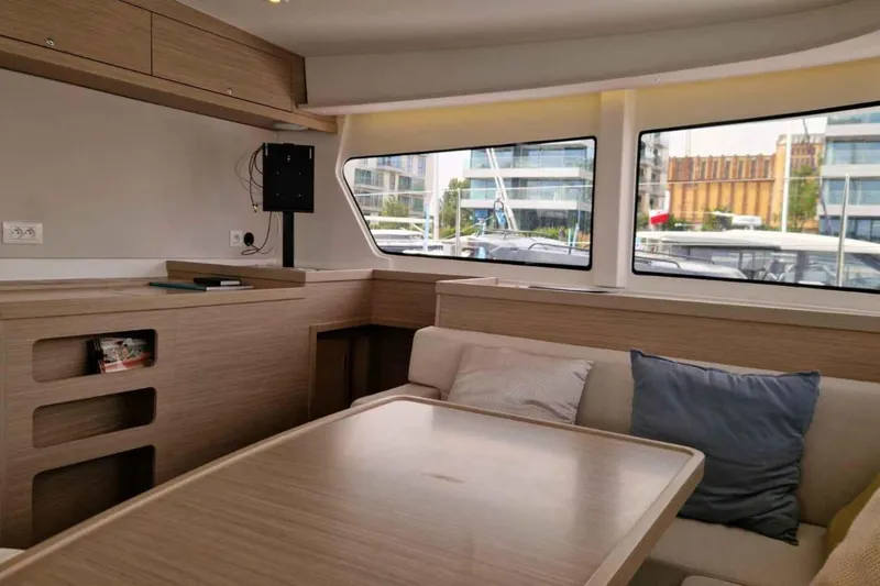  Yacht Photos Pics Interior of 2024 Lagoon 42 yacht, featuring modern design and comfortable seating.