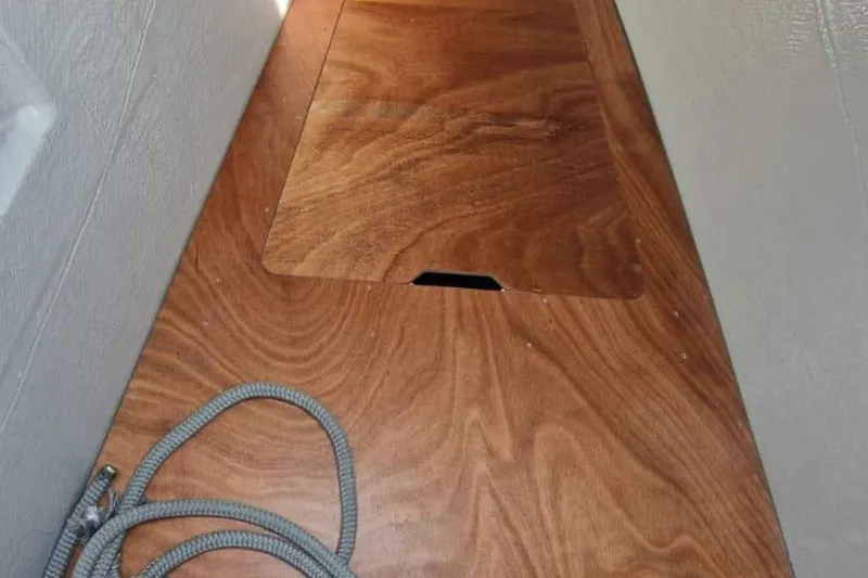  Yacht Photos Pics Wooden deck detail of 2024 Lagoon 42 catamaran with rope.